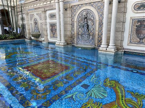 golden swimming pool gianni versace